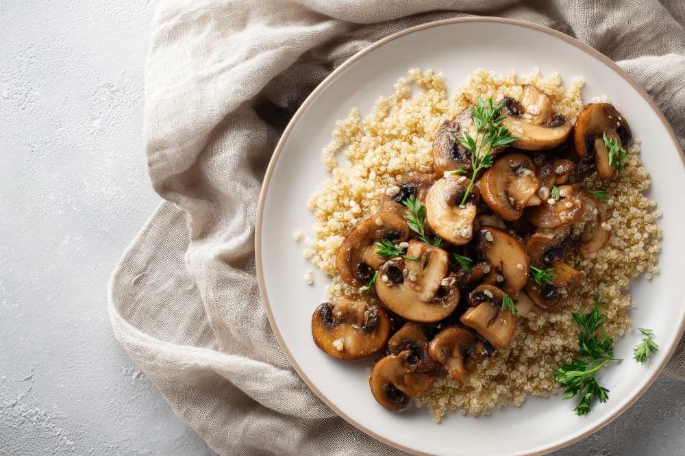 Sauteed Mushrooms and Quinoa, serve in a white plate
