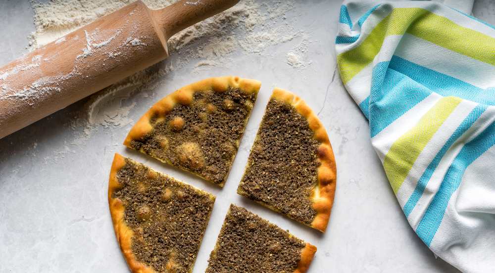 Plain Thyme pizza zaatar pie isolated on table top view