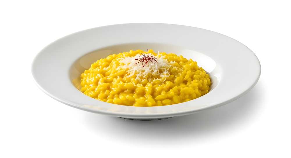 Saffron Risotto with Parmesan Cheese on White Plate. in a white background