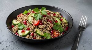 Quinoa Salad with Avocado and Pomegranate Seeds top with parsley, close up top view